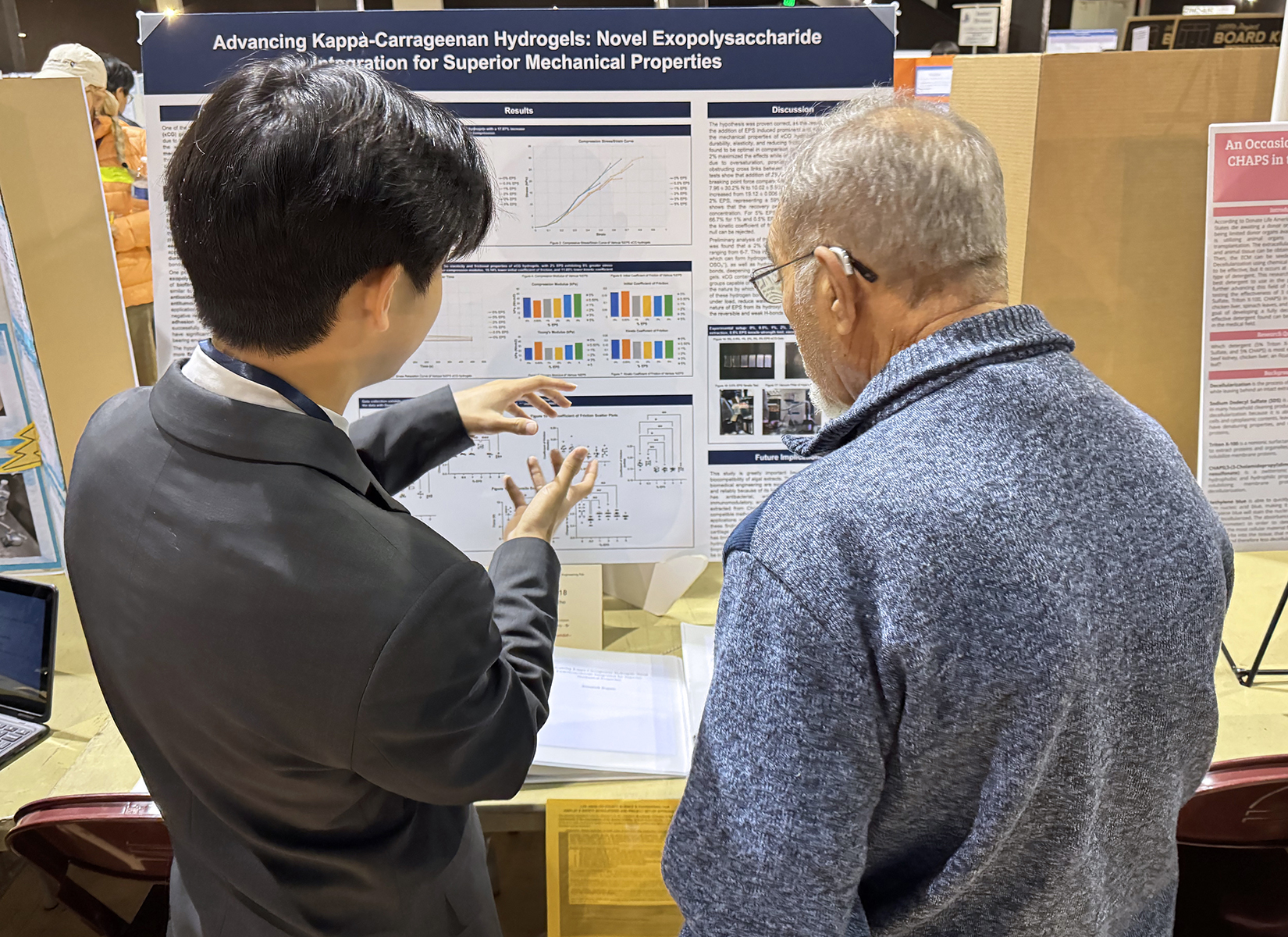 Student presenting a project to a judge at LACSEF